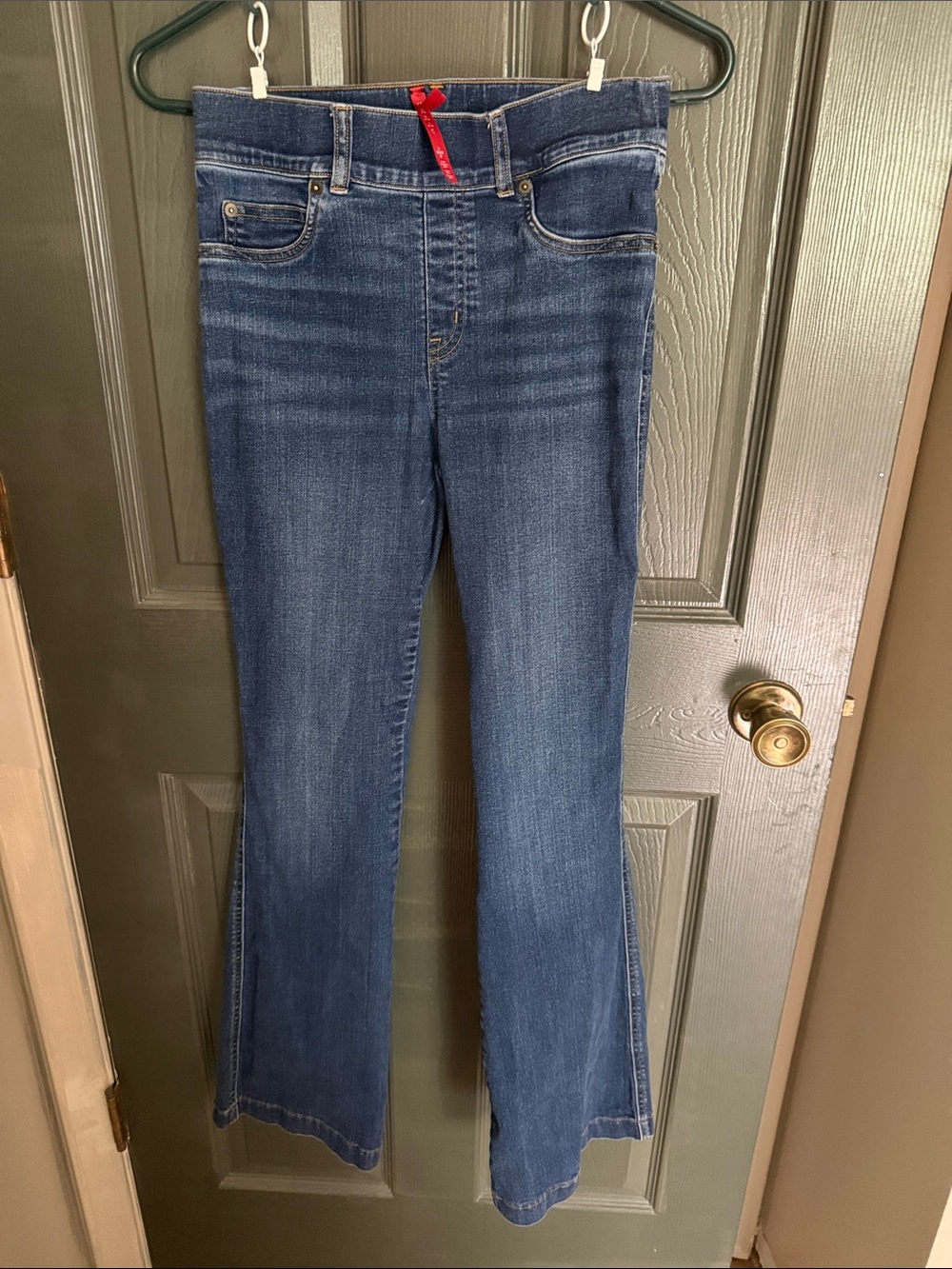 SPANX Mid-Blue Flare Jeans with Subtle Wash